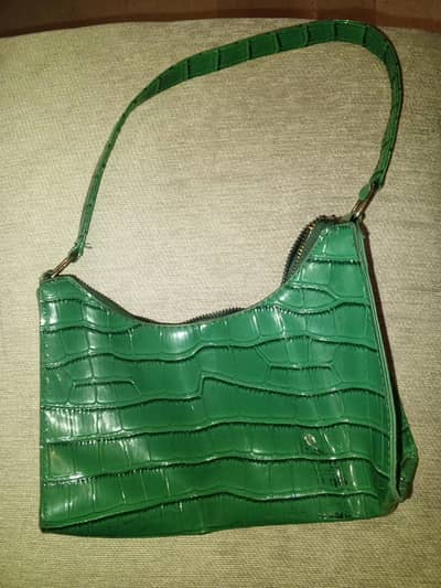 green leather bag