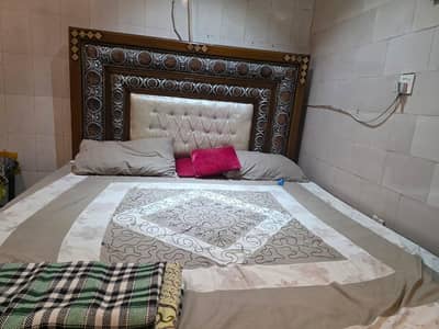 bed and side table with metric dressing table