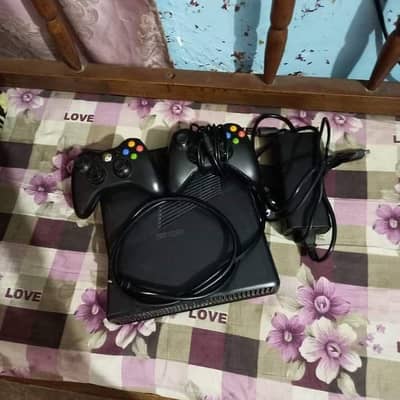 X box 360 slim with one extra controller