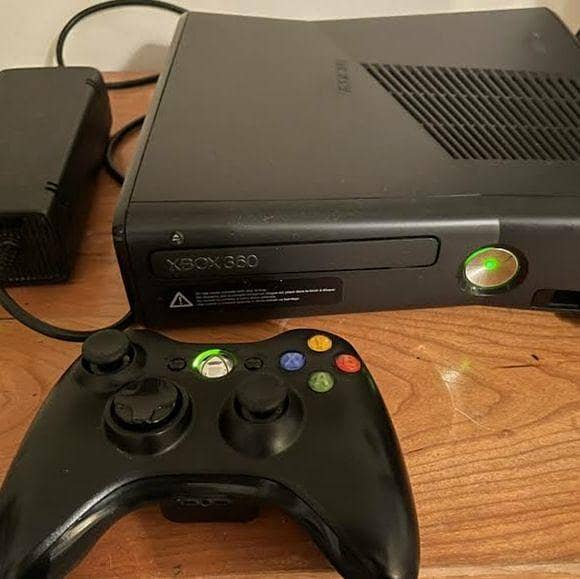 X box 360 slim with one extra controller 1
