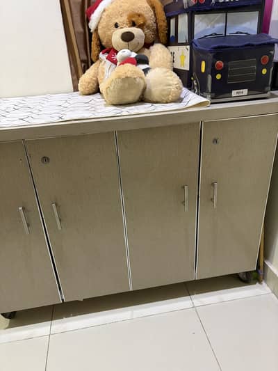 Wooden storage cabinet with four doors