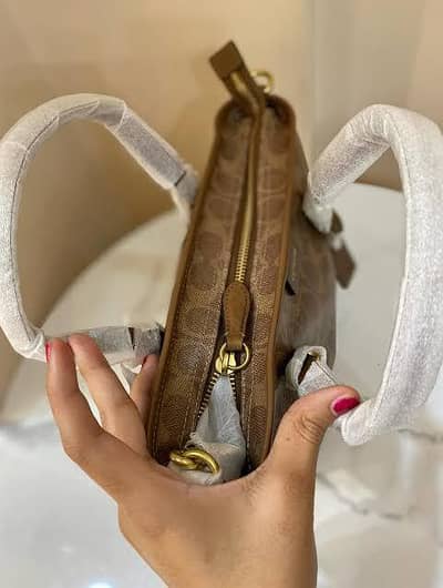 Coach Taxi Tot Signature Bag