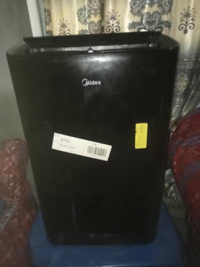 midea 1 ton AC for sall very good condition with new supply 220to 110
