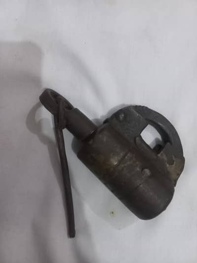 Vintage old hand forged Iron Padlock Round lock with key