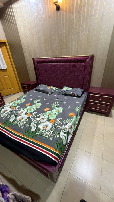 Purple bed with dressing