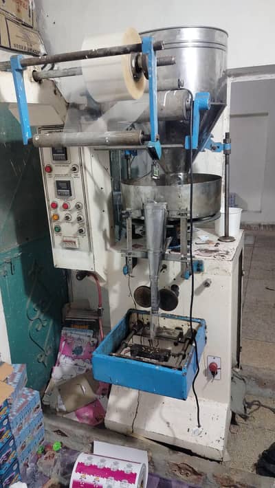Center Seal Packing Machine – Beans, Daal, Rice & Snacks Packing