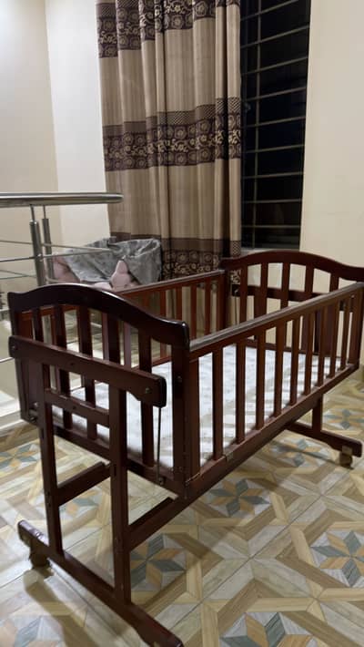 Brown baby swing