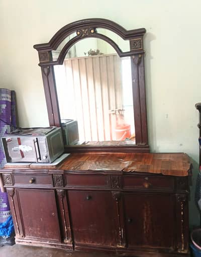 king size bed with two side tables and dressing and show case