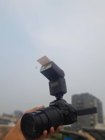 nikon d5100 flip screen mic option price full final hai flash gun