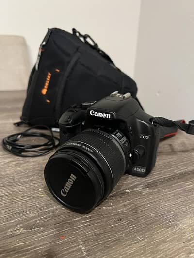 DSLR 450D Camera in mint condition for urgent sale