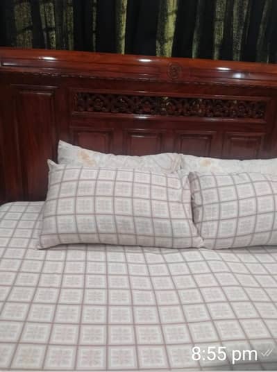 King size bed with side tables and dressing table