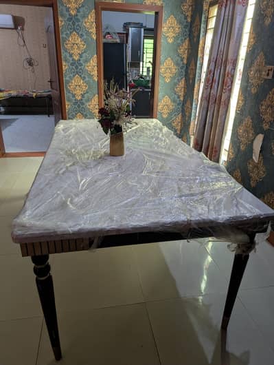 Elegant dining table with 8 luxury chairs