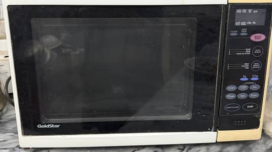 Gold star microwave perfect condition