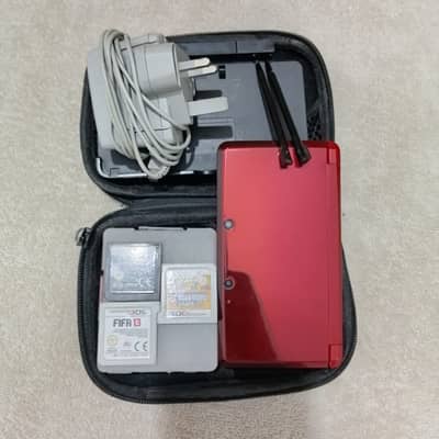 Nintendo 3DS + 3 Games — Like-New Condition with original charger and