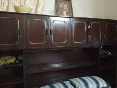 bed with cupboard
