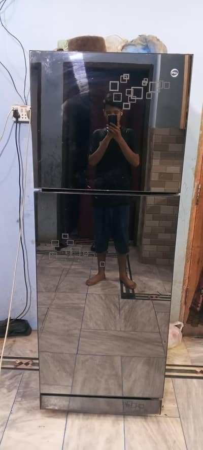 pel refrigerator glass door black colour slightly rusted