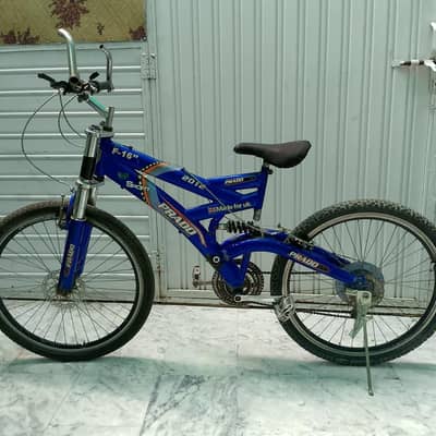 Mountain gear bicycle with shock absorber