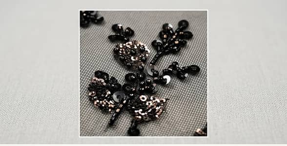 Black net embroidered saree