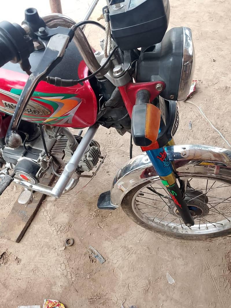 united 70cc 4