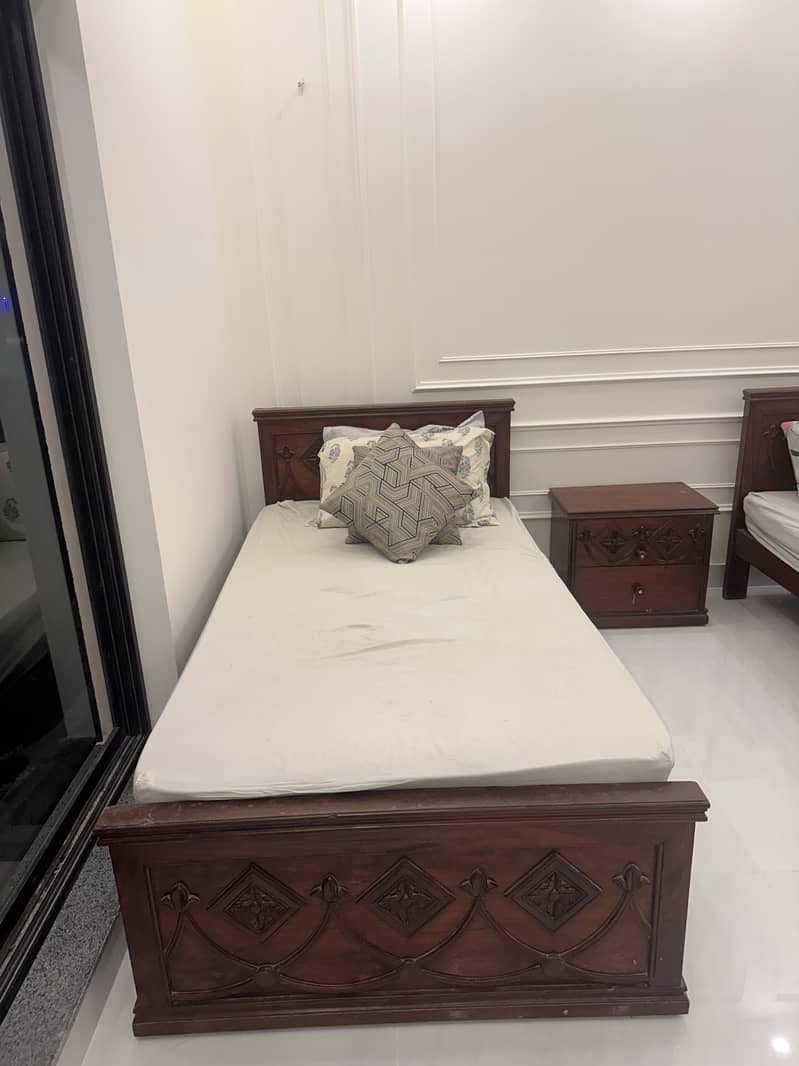 Solid wood bed in good condition. 2