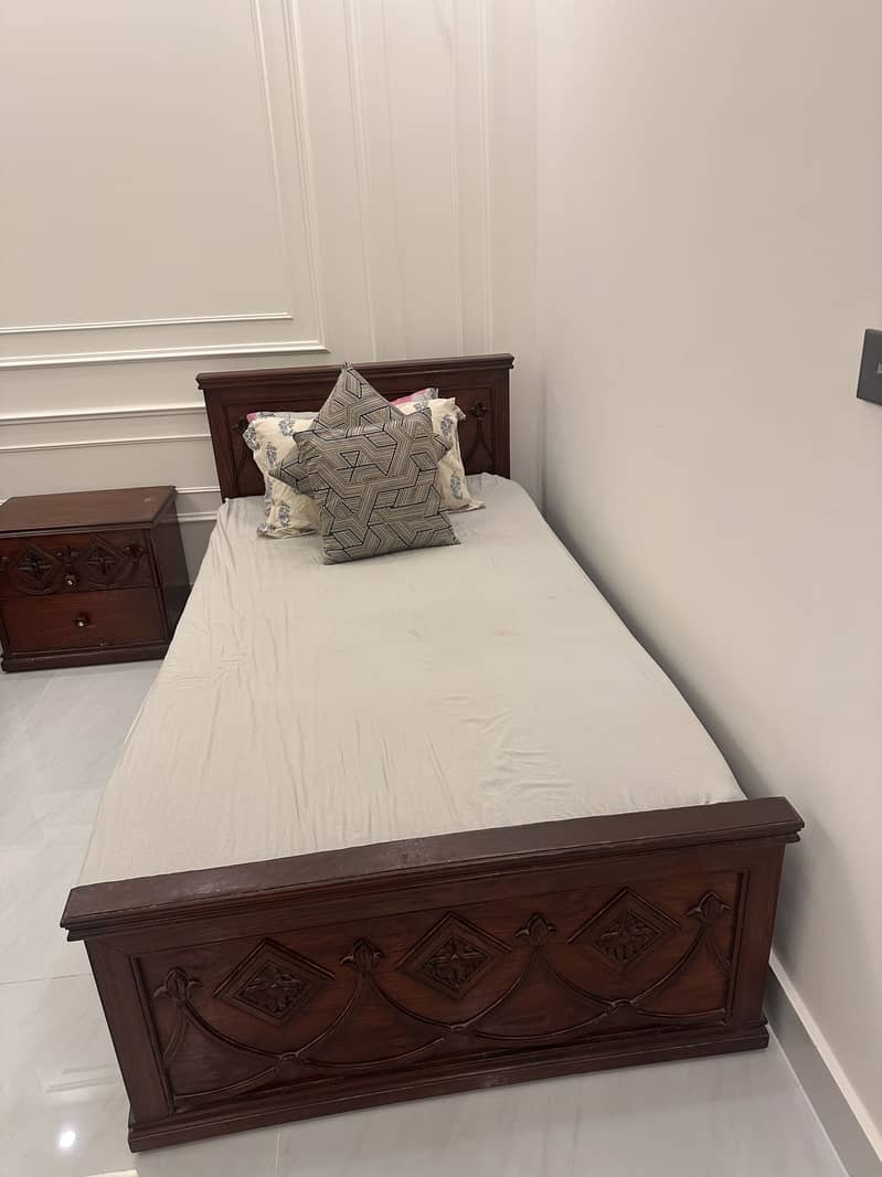Solid wood bed in good condition. 4