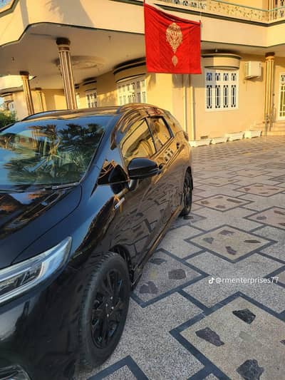Honda shuttle 2016 modhel 2019 ka number laga hai
