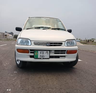 Daihatsu Cuore 2012 better than mehran cultus santro alto swift wagonR