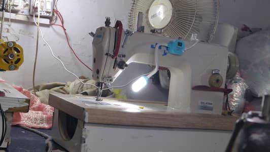 Juki machine for sewing embroidery work all in one. . .