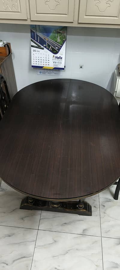 Oval shaped dining table
