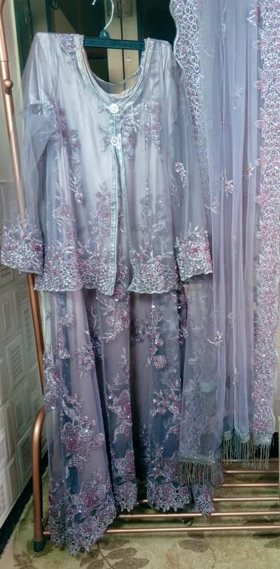 stunning lilac soft pink net maxi with a matching upper