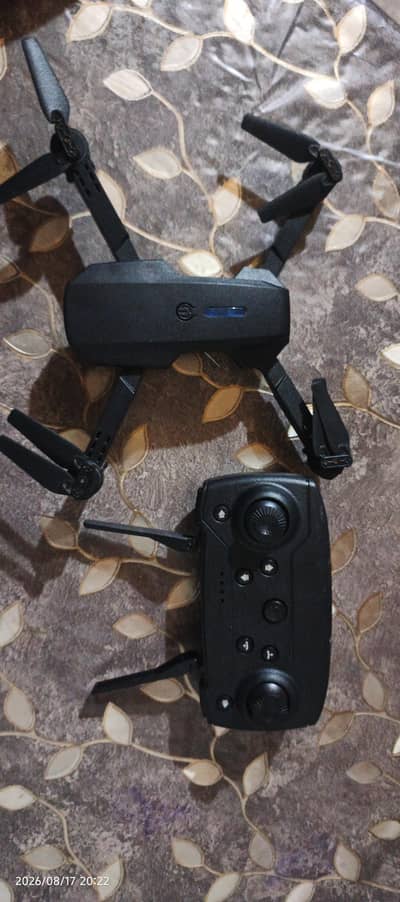 Mini RC Foldable Drone with Remote Controller – Used