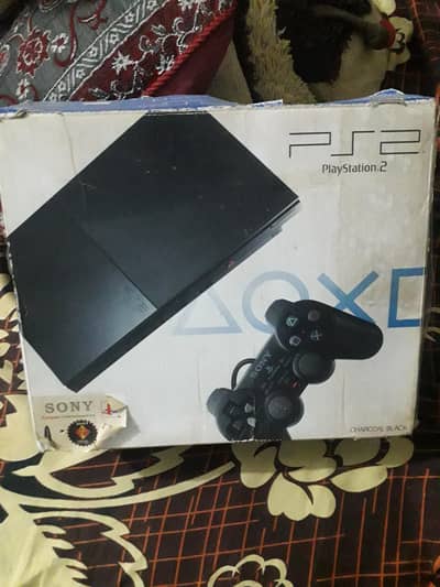 playstation 2 slim with box all ok with 50+ games CDS