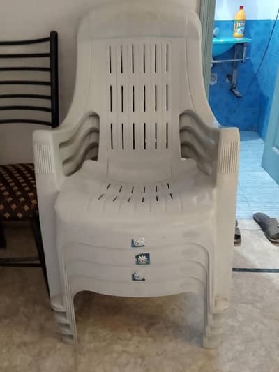 boss plastic chairs, skaters, vase, straightener