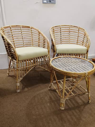 Outdoor Cane Chairs and Table in almost new 10/10 condition.
