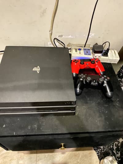 Ps4 pro with 2 orginal controller and 66 games 3 tb