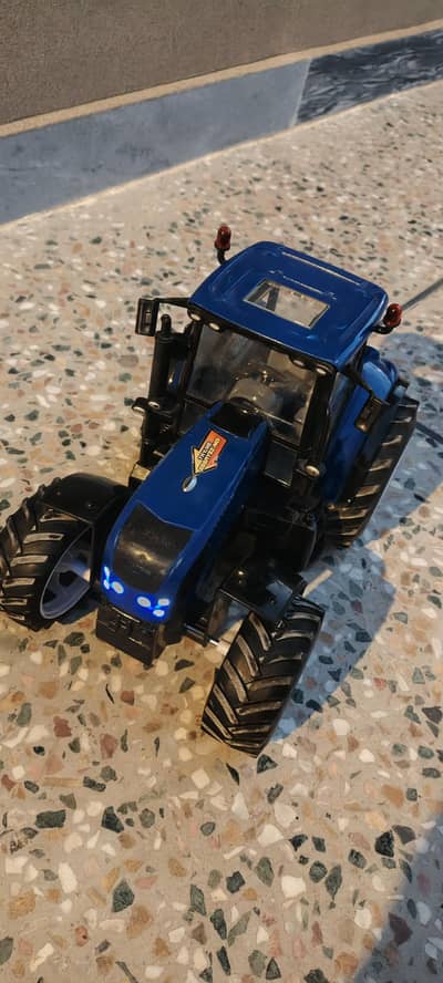 Blue Toy Tractor with Working Lights & Sounds – Great Condition