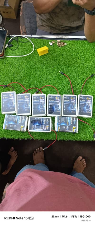 12v mini ups for 12v router with power charging adapter. .
