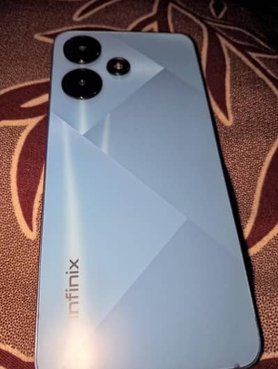 Infinix Hot 30i. 16/128