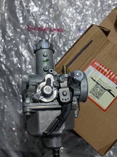 Honda 125 genuine fuel carburator.