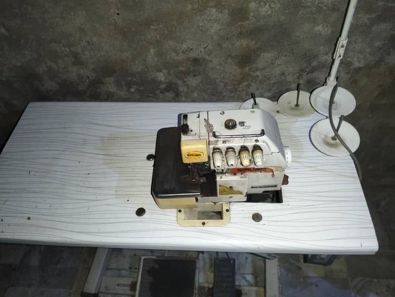 machine; overlock machine; singer machine 0