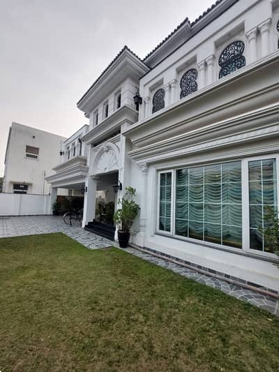 SYED BROTHERS PROUDLY OFFERS: 1-Kanal Elegant & Fully Furnished Bungalow with basement & Solar Is Available In The Best Block Of DHA Lahore.