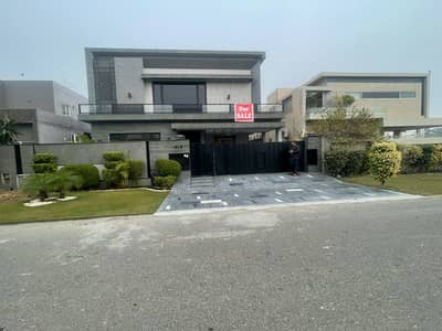 SYED BROTHERS PROUDLY OFFERS: 1-Kanal Elegant Modern Bungalow Is Available In The Best Block Of DHA Lahore.