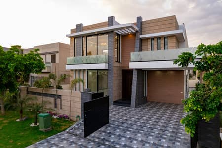 SYED BROTHERS PROUDLY OFFERS: 1-Kanal Elegant Modern Bungalow Is Available In The Best Block Of DHA Lahore.