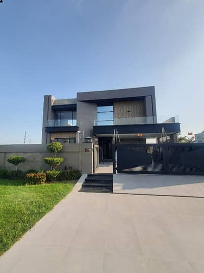 SYED BROTHERS PROUDLY OFFERS: 1-Kanal Elegant Modern Bungalow Is Available In The Best Block Of DHA Lahore.