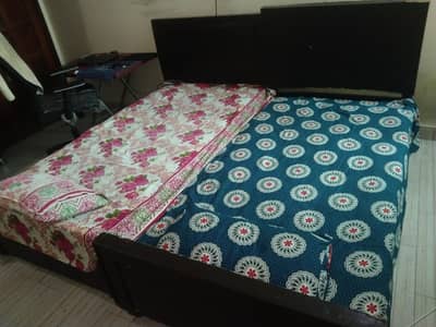 2 single wooden bed for sell