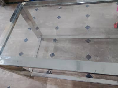 Solid heavy-duty metal frame table with thick tempered glass on top
