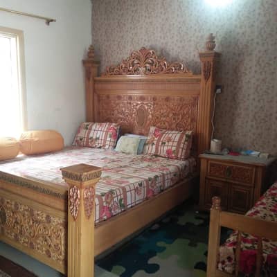 King size bed with side table and dressing Table