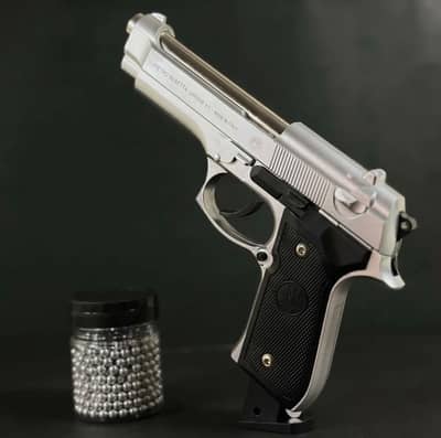 Metal toy gun with metal BB bullets all functions work like real gun