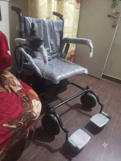 Electric Wheel chair, motored wheel chair , chargeable wheel chair
