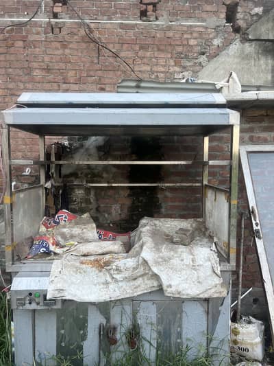 It has a frying pan and a fryer.